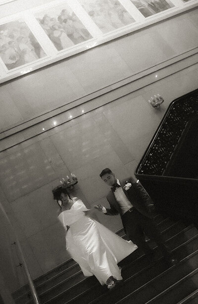 Couple walking down the steps at Carnegie Museum of Art Wedding
