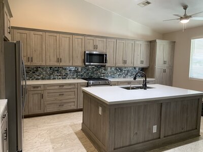 Kitchen Remodel with New Modern Cabinets and Green Backsplash