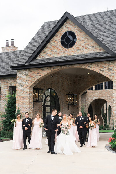 bride and groom dance during formal photos at The Farmhouse wedding venue in Houston Texas by Swish and Click Photography