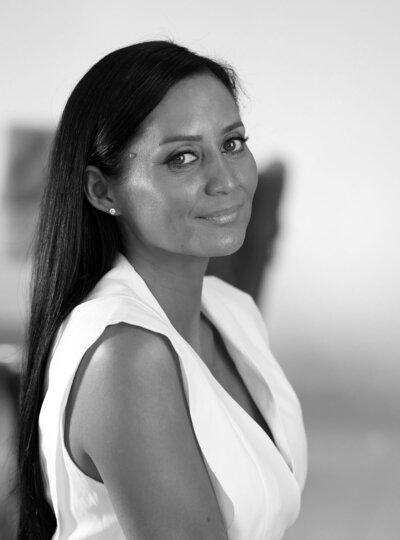 Black and white headshot of Sam Maddison, mindset and manifestation coach at The Maddison Edit.