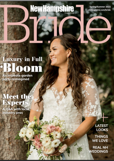 Bride smiling holding bridal bouquet