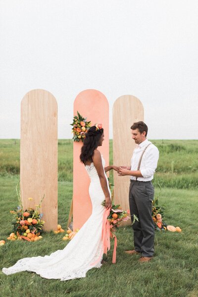 Bright clementine garden wedding captured by A List Studio, timeless and creative wedding videographer in Calgary, Alberta. Featured on the Bronte Bride Blog.