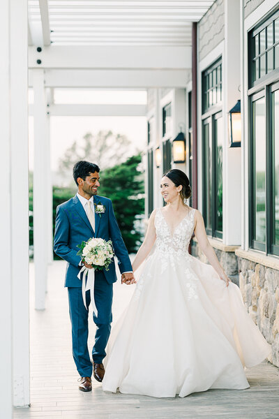 Bride and groom exchanging vows along the Half Moon Bay coast, with the Pacific Ocean and dramatic cliffs creating a breathtaking backdrop.