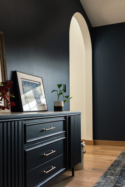 dark blue office with bright archway design 
