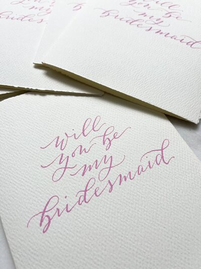 Bridesmaid proposal card with pink calligraphy