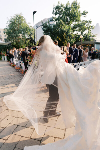 couple kissing on boat in front of chicago skyline
