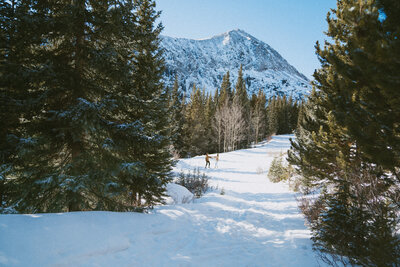 couple spinning in the rocky mountains