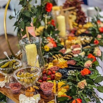 Delicious charcuterie table packed with mouthwatering snacks for your guests during your event at our indoor Clearwater event venue - A delectable treat for all
