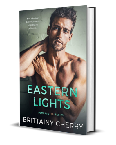 man with beard wearing a white shirt looks down on the cover of the air he breathes by romance author brittainy cherry