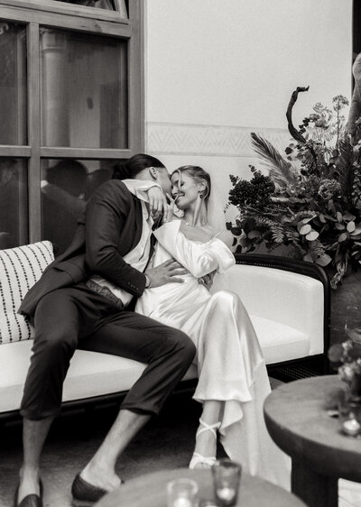 bride pulling the groom close to her face