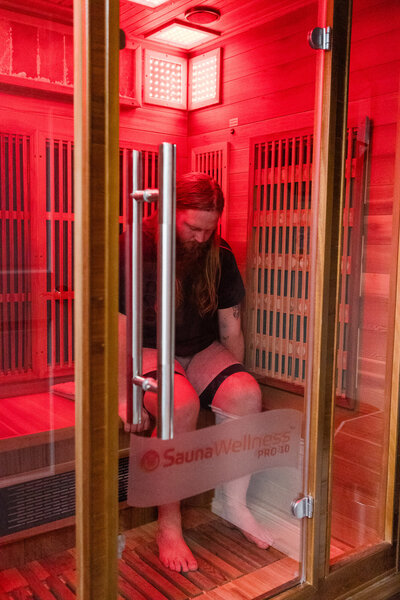 Man sitting in infrared sauna