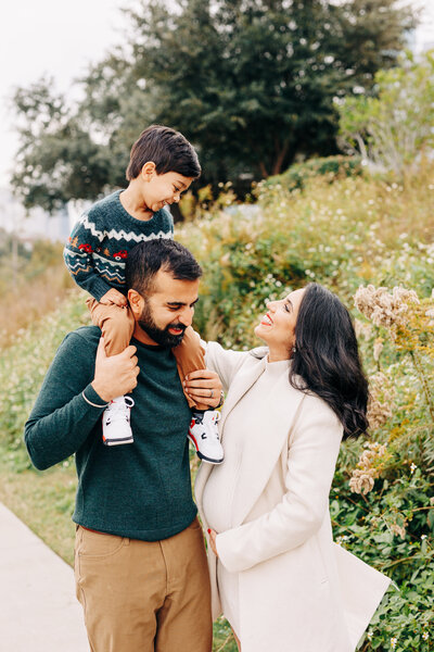 a couple and their newborn baby during their Houston newborn session