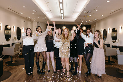 Salon team of happy thriving hairstylists in texas