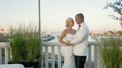 Bride and groom kissing during first dance