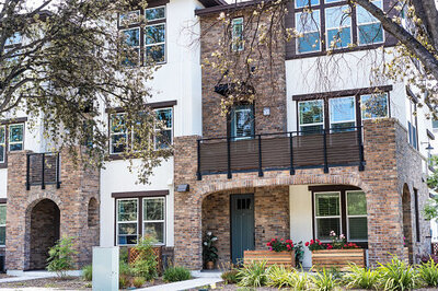 Palm trees in downtown San Jose near high rise apartments