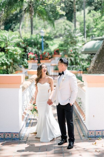 Bride and groom walk up memorial steps at their DC wedding