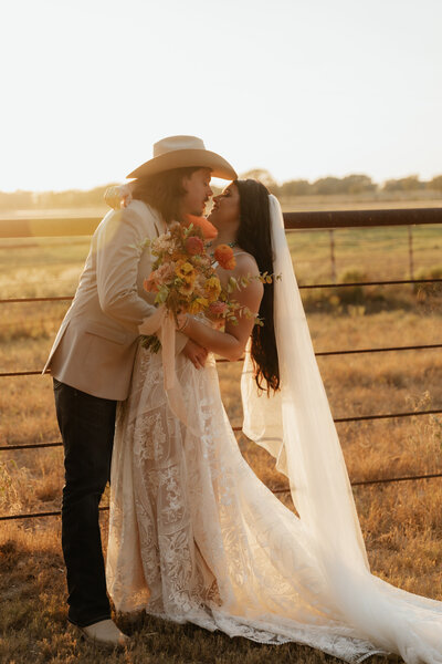 bride and groom kissing
