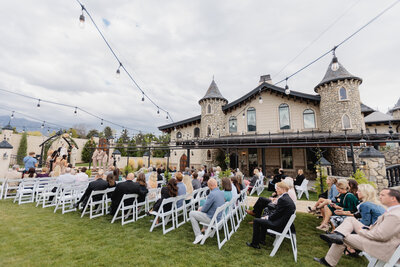 The north garden of the castle features an archway as an aisle and lawn space for guest seating