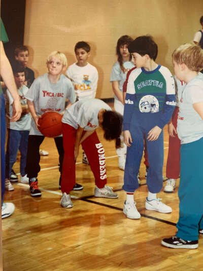 Marcia Alvarado Playing Ymca basketball as a young child, learning all about teamwork and discipline. 