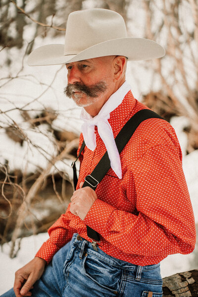 Outdoor shot of Chuck Podesta modeling western fashion in Reno, NV