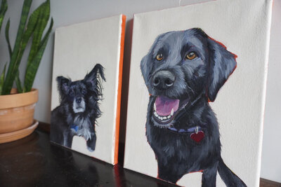 paintings of black dogs