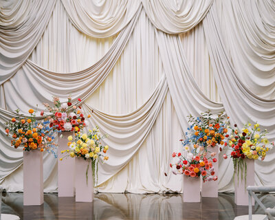 colorful wedding ceremony flowers