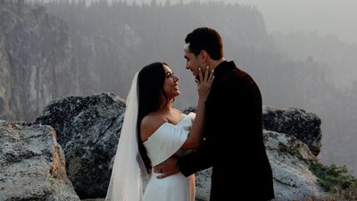 bride and groom holding eachother