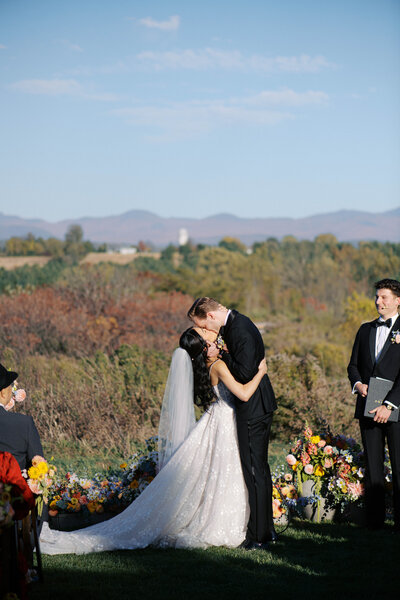 film photo of bride and groom exchanging vows at classy luxury wedding ceremony at Crane Estate in Ipswich, Massachusetts