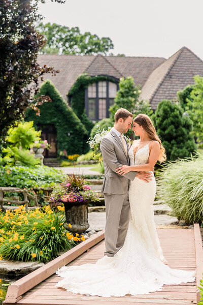 Bride and groom embrace at the Monte Bello Estate wedding venue in Lemont Illinois.