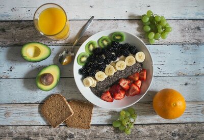 Nutritious food - chia seed and fruit breakfast bowl with avocado