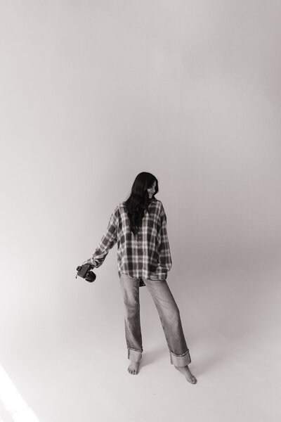 pnw photographer Erica Rochelle holding a film camera