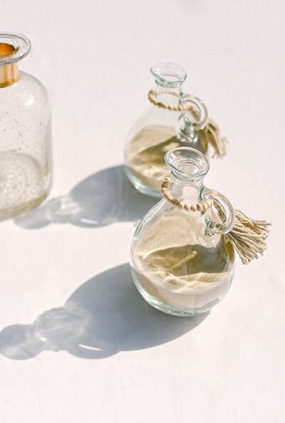 glass jars filled with sand