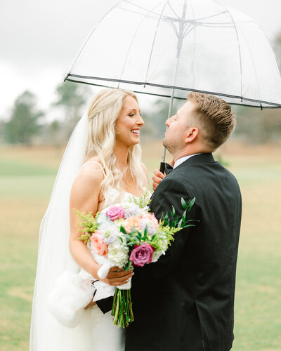 Romantic fine art wedding photography by Abby Bell in Alabama, showcasing the bride and groom dancing at an elegant reception.