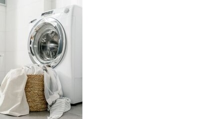 white front load washing machine with wicker basket in front