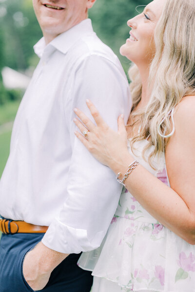 Man kissing woman's forehead