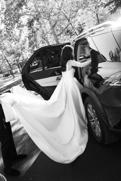 Bride and groom laugh at Rodin Museum