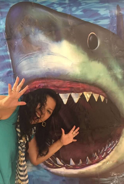 posing getting frightened by a jaws poster