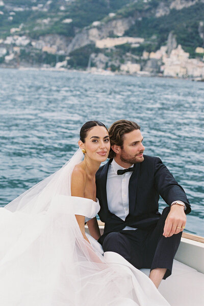 Wedding and Elopement Photography, couple sitting together on a boat