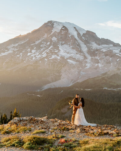 couple walking beach cliffs