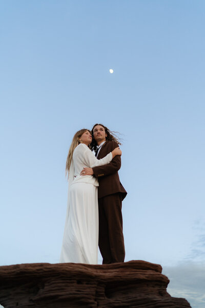 couple and their wedding party during golden hour