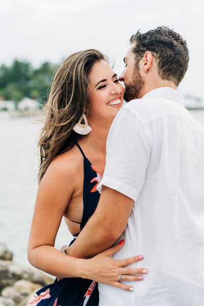 Engaged couple on snake island florida.  Beachy hair and natural makeup