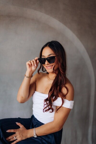 Professional portrait of a Kemotion designer, focused on website design tips for service-based businesses.