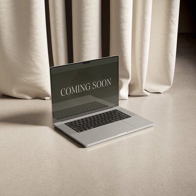 Mockup of a laptop displaying a ‘Coming Soon’ message on the screen
