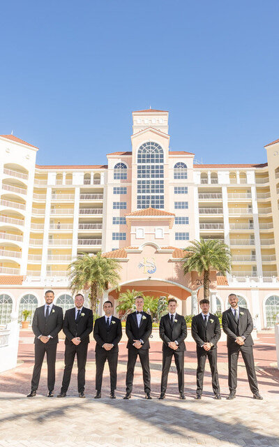 Groomsmen in front of a wedding venue in Palm Coast FL