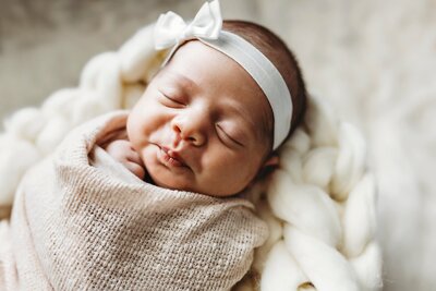 newborn baby in neutral colors