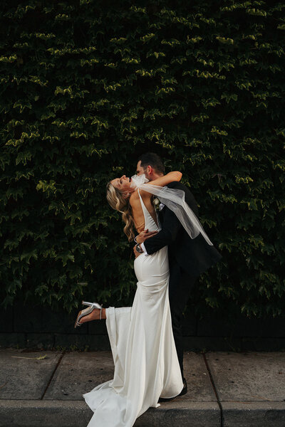 bride and groom hugging during portraits at their Rupert on Rupert Wedding in Collingwood