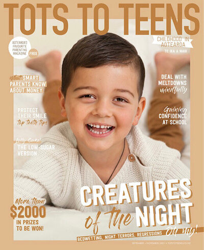 A magazine cover for Tots to Teens with a smiling boy