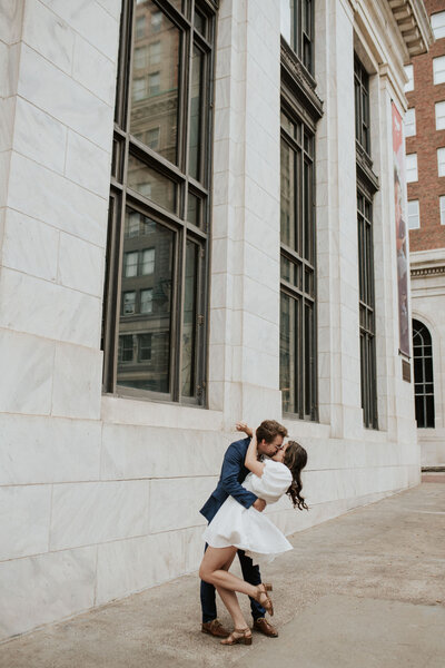 a couple kissing downtown kansas city