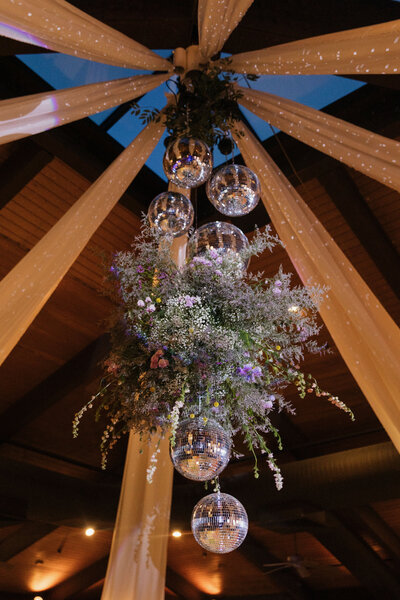 Floral designer and disco ball rentals in Phoenix installed at McCormick Ranch ballroom