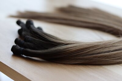 Premium hair extension service with custom color blending in Neenah near Appleton WI